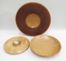 A large turned and textured sycamore centre bowl, together with another two signed bowls, max 39cm