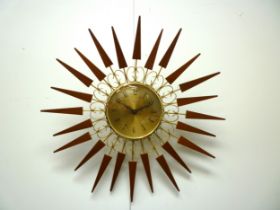 A Paico sunburst wall clock, battery operated, 53cm diameter