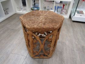 A 1960's peacock cane/rattan sidetable/plant stand, 41.5cm high