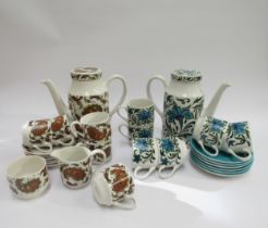 A Midwinter Pottery part coffee set in the scarce Baroque pattern by Jessie Tait and a part coffee
