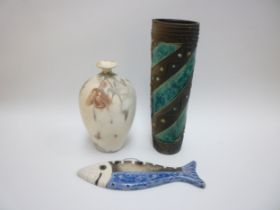 Three raku pottery pieces, slab built vase in blue, thrown vase in white with line and a fish wall