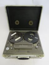 A Tandberg Series 84 reel to reel tape recorder