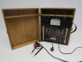 A Supreme Instruments Corp Model 504-A valve / tube tester in fitted wooden case