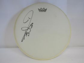 IRON MAIDEN: A 13" Remo drum head signed by Nicko McBrain