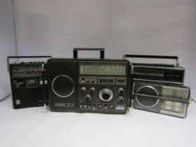 Four Grundig radios to include Grundig Satellit 1400SL Professional, Yacht Boy, Yacht Boy 1100 and
