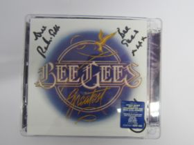 BEE GEES: 'Bee Gees Greatest' CD, booklet signed in marker pen by Robin Gibb 2011