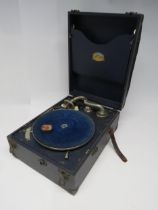A Scotia portable wind up gramophone with Songster sound box