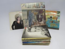 A collection of mixed LP's, predominantly by 1960's and 1970's artists including David Bowie,