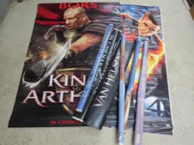 A collection of large cinema film posters to include King Arthur, The Fantastic 4 The Rise Of The