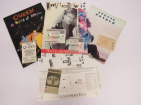 Three tour programmes with concert ticket stubs to include Queen 'A Kind Of Magic' tour with