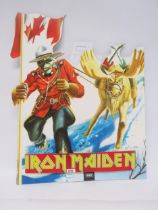 IRON MAIDEN: A rare Canadian EMI shop card standing display depicting Eddie as a Mountie with