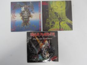 IRON MAIDEN: Three autographed 7" singles to include 'Infinite Dreams' (EM 117) sleeve signed in