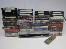 A collection of approximately 30 music video and concert film VHS cassette tapes including Jimi