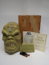IRON MAIDEN: 'Eddie Head' CD box set, the green plastic Eddie shaped box with light up LED eyes.