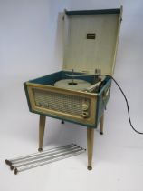 A mid 20th Century Dansette Bermuda record player, raised associated on tapering legs, together with