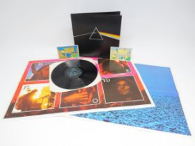 PINK FLOYD: 'The Dark Side Of The Moon' LP, complete with two posters and two unpeeled stickers (