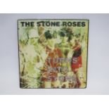 THE STONE ROSES: 'Turns Into Stone' LP on Silvertone Records (ORE LP 521, vinyl and sleeve VG)