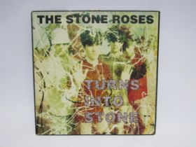 THE STONE ROSES: 'Turns Into Stone' LP on Silvertone Records (ORE LP 521, vinyl and sleeve VG)