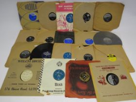 A collection of 78rpm 10" shellac records including Fats Domino, Elvis Presley, Little Richard,
