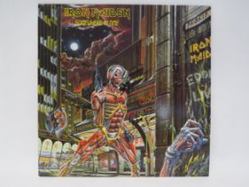 IRON MAIDEN: 'Somewhere In Time' autographed LP, sleeve signed in marker pen by Bruce Dickinson,