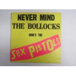 SEX PISTOLS: 'Never Mind The Bollocks' LP, early UK pressing with blank rear sleeve, 12 tracks