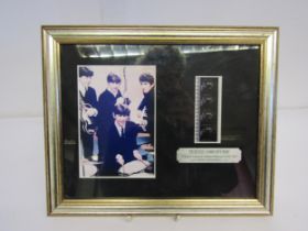 THE BEATLES: A limited edition A Hard Day's Night filmcel presentation, with certificate of
