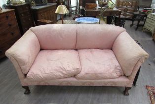 A Howard & Sons sofa on claw and ball feet, rear legs stamped, 84cm wide