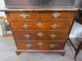 An 18th Century walnut diminutive chest of two short over three long drawers, brass handles and