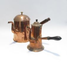 A Victorian large copper coffee pot with treen handle and another with ebony handle of smaller form.