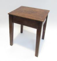 A 19th Century oak square topped stool with square tapering legs. 39cm x 31.5cm x 26cm