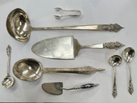 Mixed Thai Sterling and white metal serving instruments including six pieces by Alex & Co, ladle,