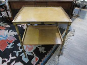 An early 20th Century bamboo effect two tier what-not / side table with 3/4 gallery back, on