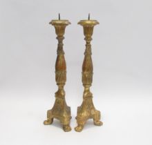 A pair of late 19th Century gilded wood pricket candlesticks, 47cm tall