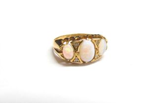 An 18ct gold opal and diamond ring. Size L, 3g