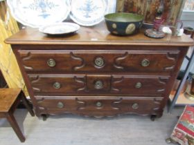 WITHDRAWN: A 19th Century French walnut chest of three long drawers with carved detail