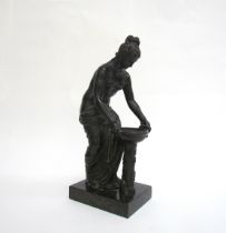 A late 19th Century French Grand Tour style bronze figure of Danaides with a bowl. The female figure