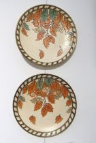 Two Charlotte Rhead chargers with orange foliate decoration pattern. Number 4921 one with marks