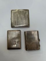 Two Birmingham silver cigarette cases Mappin & Webb 1927 and G F Westwood & Sons 1949 and a