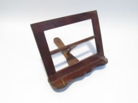 A mahogany folding tabletop music stand. 24.5cm x 28.5 cm x 29 cm
