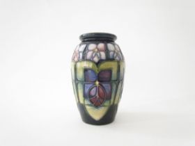 A Moorcroft Violet pattern vase of small proportions, 11cm tall