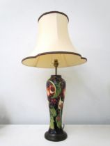 A Moorcroft lamp in the "Peaches" pattern, the ceramic base, 37cm high