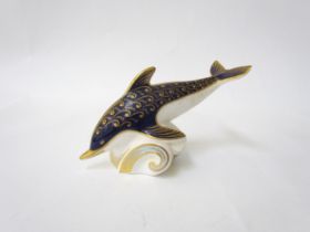 A Royal Crown Derby paperweight as a Dolphin, gold stopper