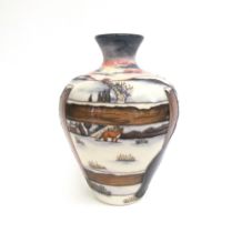 A Moorcroft ‘Who Goes There?’ pattern vase designed by Anji Davenport, 18cm tall