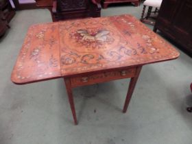 A 19th Century folk art style drop-flap table with painted top, musical instrument and floral