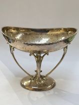 An Elkington & Co. Ltd. Art Nouveau silver tazza, planished bowl with stylised supports, 13cm