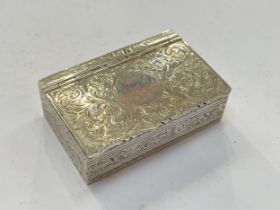 A George III Scottish silver snuff box, allover chased scrolled foliate detail, gilded interior,