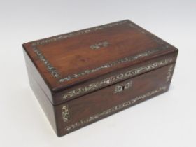 A Victorian rosewood writing box, mother-of-pearl foliate and floral borders and escutcheon,