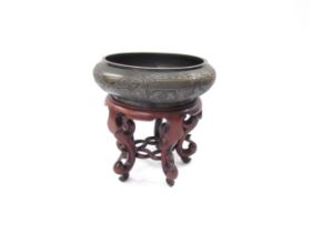 A Chinese bronze censer on hardwood stand, diameter 20cm, height total 22cm