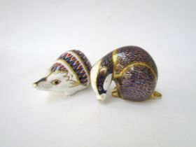 A Royal Crown Derby badger paperweight, gold stopper and a Royal Crown Derby paperweight as a