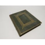 A 19th Century bound and gilded album containing written verse and pros, including handpainted image